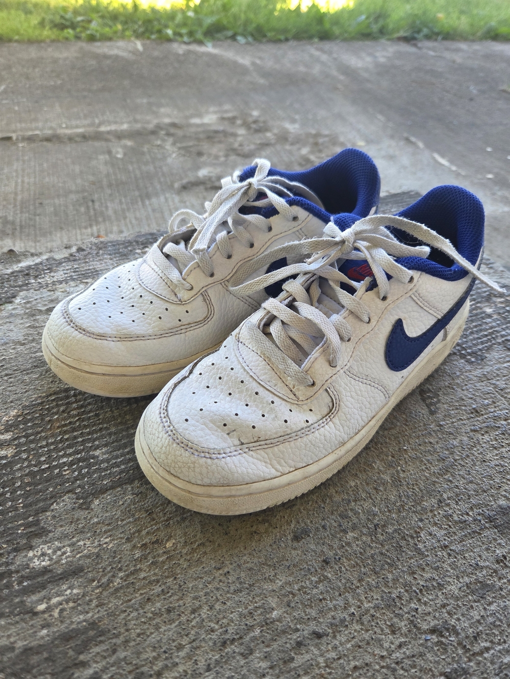 Nike Kids White Sneakers with Blue Swoosh